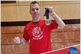 Collage vom Kollegen mit Medaille