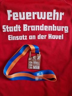 Medaille auf Shirt