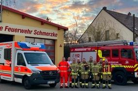 Gruppenfoto vor dem Gerätehaus der FF Schmerzke